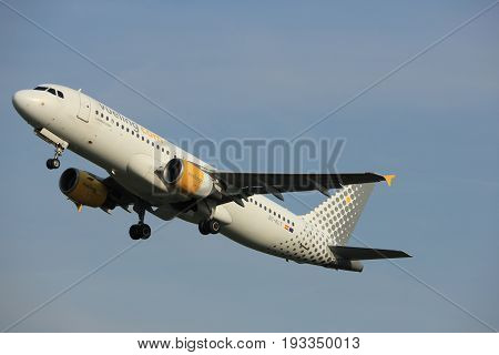 Amsterdam the Netherlands - June 2nd 2017: EC-KLT Vueling Airbus A320-200 taking off from Polderbaan Runway Amsterdam Airport Schiphol