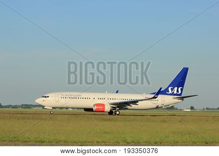 Amsterdam the Netherlands - June 1st 2017: LN-RGH SAS Scandinavian Airlines Boeing 737 taking off from Polderbaan Runway Amsterdam Airport Schiphol