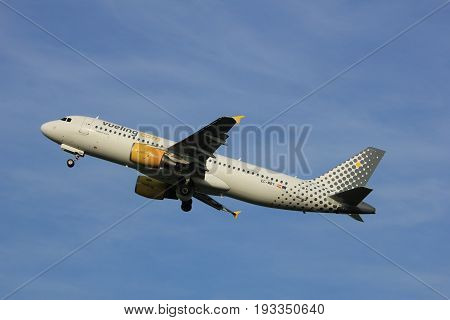 Amsterdam the Netherlands - June 2nd 2017: EC-MBY Vueling Airbus A320 taking off from Polderbaan Runway Amsterdam Airport Schiphol