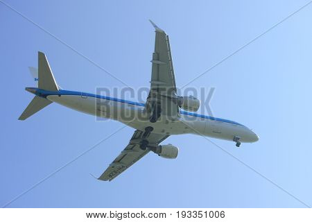 Amsterdam the Netherlands - April 9th 2017: PH-EZR KLM Cityhopper Embraer ERJ-190STD approaching Polderbaan runway at Schiphol Amsterdam Airport the Netherlands