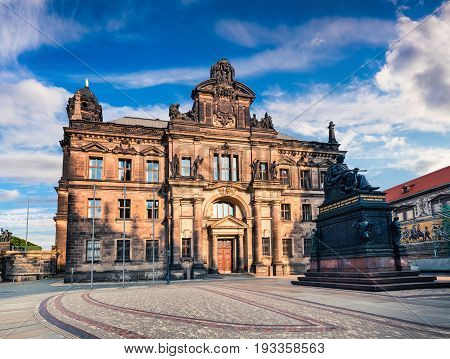 Sunny Cityscape Of Dresden With Court Of Appeal And Statue Of Frederick Augustus.