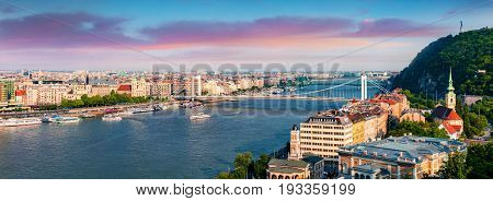 Panoramic Cityscape Of Pest City With Elisabeth Bridge On The Danube River.
