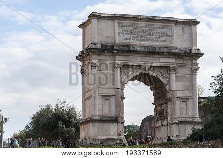 ,Tourists visiting the Arch of Titus, on December 28, 2013, in Rome, Italy
