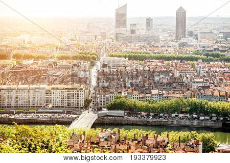 Aerial cityscape view on Lyon with Rhone river and skyscrapers during the morning light in France