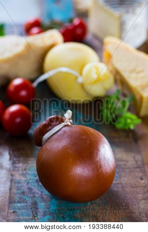 Traditional Italian Hard Cheese Provolone Of Caciocavallo, Smoked And White