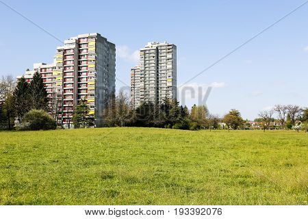 Bern Switzerland - April 14 2017: Architecture in the Murifeld district. Concrete multi-family houses dominate over the surrounding green fields