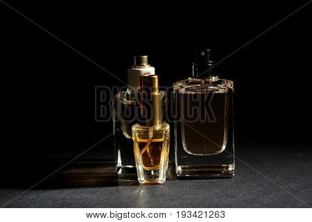 Perfume bottles on dark background