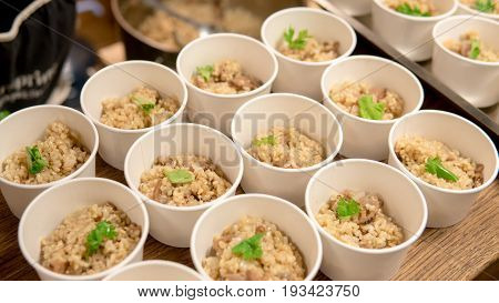 Brown Rice Is Divided Into Portions Close-up. Macrobiotics And Healthy Nutrition.