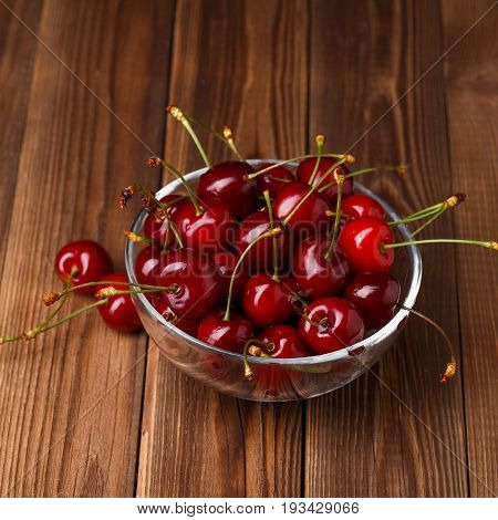 Bowl with fresh red Cherries. Healthy food concept
