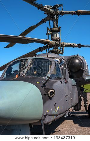 Pushkin, Russia - June 5, 2017: Details of the rotor and part of the body of modern military helicopters closeup. In the foreground the pilot's cabin.