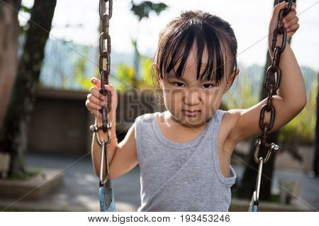 Asian Little Chinese Girl Playing Swing
