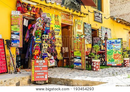 OLLANTAYTAMBO, PERU - 27 APRIL 2017: Streets of the small, medieval city of Ollantaytambo, with old houses on Andes Mountains