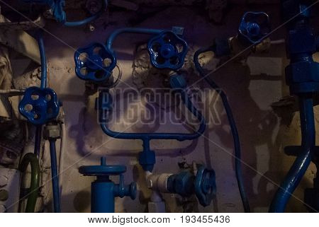 Kaliningrad, Russia - June 12 2017: Close-up View Of Blue Valves And Tubes Of Different Sizes, A Mac
