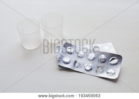 Used Packs Of Pills On Medical Table
