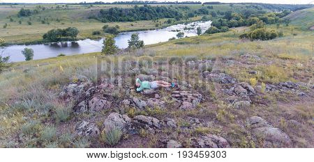 The Girl On The Stone Is The View From The Top