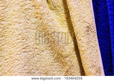 Beautifully Lit Yellow and blue Fabric Texture or background