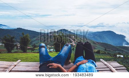 Lover Men and women Asia travel relax. Morning atmosphere nature Forests mountains. Phu Thap Buek Thailand