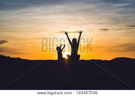 Fit Mother With Son Running At The Desert In Gran Canaria, Maspalomas On Sunset