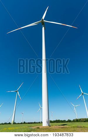 Wind farm with many wind wheels seen in Germany