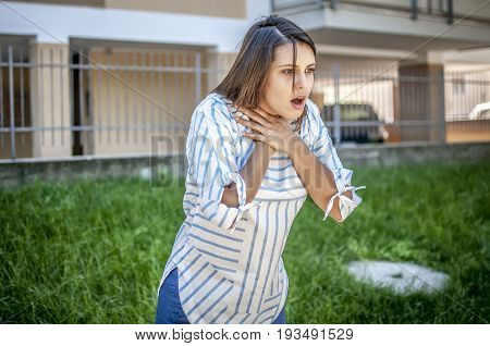 girl searching help while she's chocking during feeding