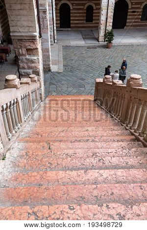 VERONA ITALY - MAY 1 2016: Scala della Ragione in the Courtyard of the Palazzo della Ragione in Verona. Italy