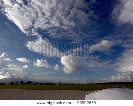 Beautiful cloud formations
Wads of cottony white clouds cover the skies above Saipan International Airport