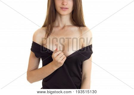 beautiful sexy breast young girl under the black dress isolated on a white background close-up
