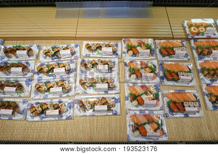 SHENZHEN, CHINA - FEBRUARY 04, 2015: sushi on display at JUSCO store in ShenZhen