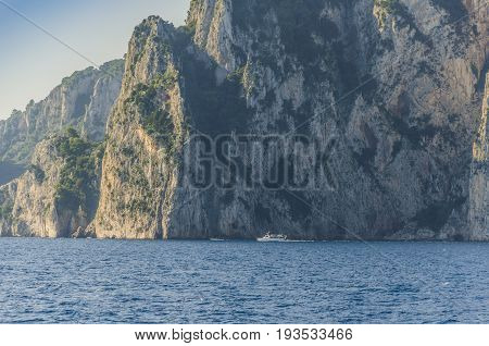 The majesty of the Amalfi coast compared to a passenger boat.