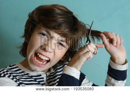 Teenager Boy Cut His Hair With Scissors