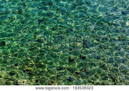 Clear water texture photo on Corfu island in Greece
