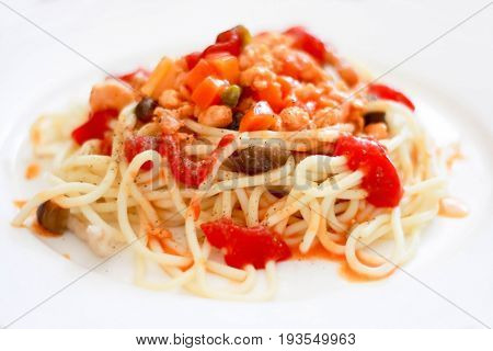 spaghetti tomato sauce in the white dish isolated