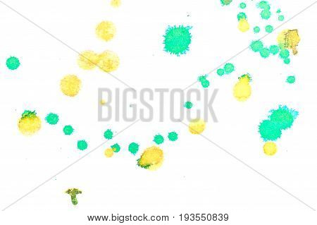 Abstract two-color yellow green ink splash. Ink blots. Elements of design. The water-soluble ink on white paper Leste. Abstractionism