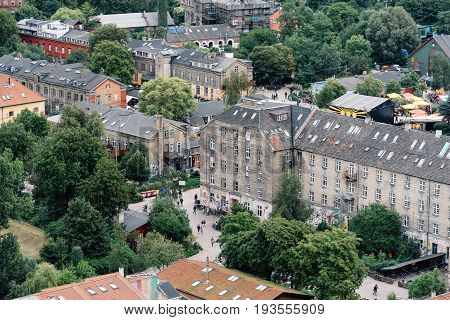 Copenhagen Denmark - August 12 2016: Aerial view of Christiania in Copenhagen a cloudy day of summer. Also known as Freetown Christiania is an autonomous settlement.