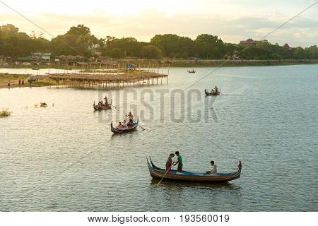 Ubein bridge World longest wooden bridge at sunrise at Taungthaman Lake Amarapura Mandalay Myanmar Burma