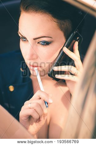 A young pretty brunette like a business woman