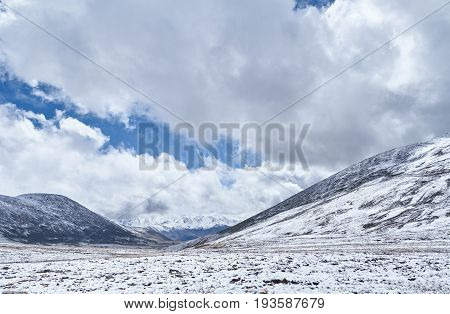 Autumn landscape of Altay. Sunset in the steppe beautiful evening sky with clouds plato Ukok no one around Altai Siberia Russia
