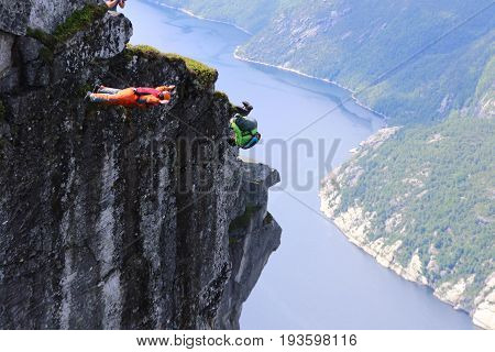 Skydiving over beautiful Norway. Clouds, sun and sky