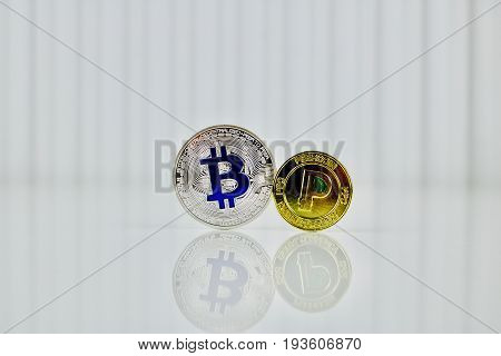 Blue Bitcoin And Gold Peercoin