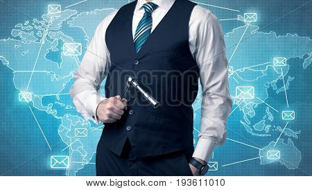 Businessman holding tool with global map graphic on the background