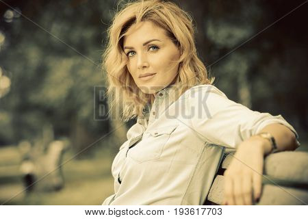 Happy middle aged woman on a summer day. Mood of summer and carefree vacations. Beauty, cosmetics.