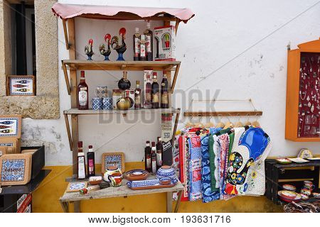 Souvenirs On The Streets Of The Picturesque Town Of Obidos, Portugal