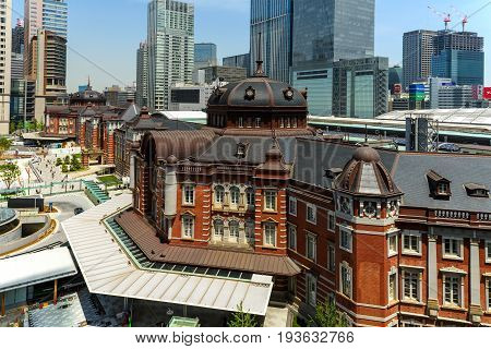 Tokyo, Japan - May 8, 2017: Unidentified People At Tokyo Station Antique Building Against Blue Sky I