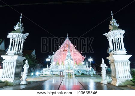 chiangrai temple at night with light turn on