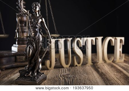 Justice concept, Themis, gavel and scale on wooden table.