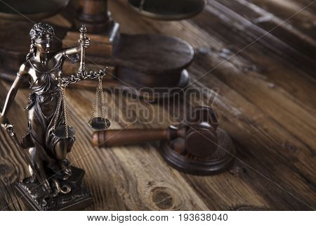 Justice concept, Themis, gavel and scale on wooden table.