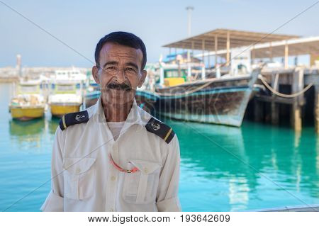 Hormuz Island Hormozgan Province Iran - 17 april 2017: Iranian Island of Hormuz in Persian Gulf A portrait of the captain of a passenger boat cruising between the island and the big earth.