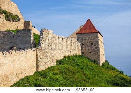 Rupea Romania - June 23 2013: Old medieval fortress on top of the hill Rupea village located in Transylvania Romania