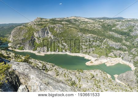 Panoramic photo of a Donnell Lake. Lake and a dam are located on Stanislaus river. California, USA