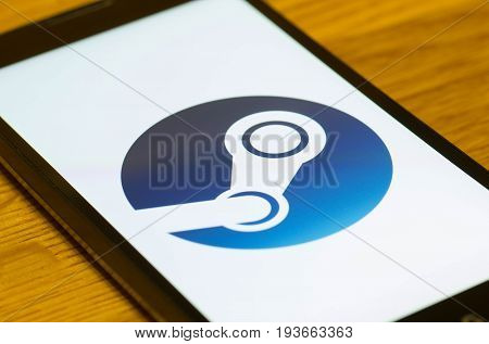 SARANSK, RUSSIA - JULY 02, 2017: A Smartphone screen shows logo of Steam. Selective focus.